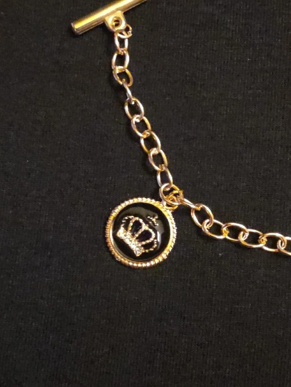 Gold-Tone Charm Bracelet with Purse, Bow and Coin Charms